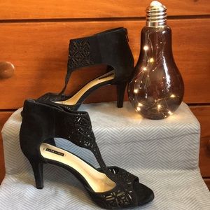 Black felt heels with sequins.